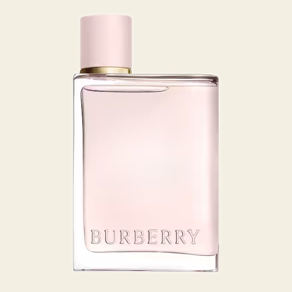 Flacon de parfum Her par Burberry sur fond ivoire
