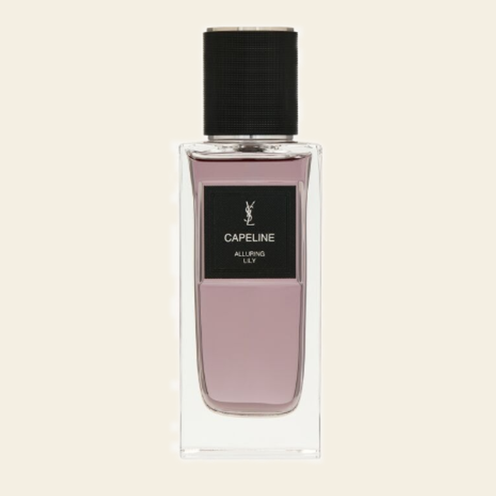 Flacon de parfum Capeline par Yves Saint Laurent sur fond ivoire