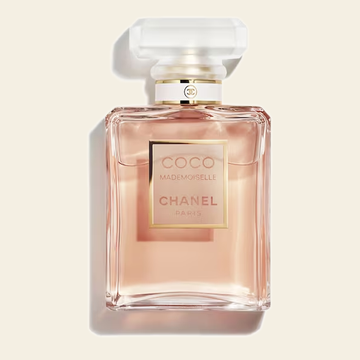Flacon de parfum Coco Mademoiselle par Chanel sur fond ivoire