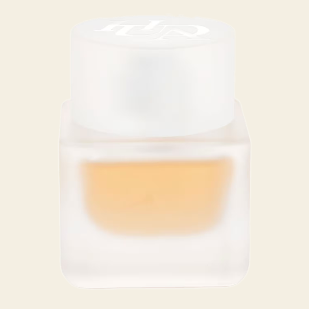 Flacon de parfum Easy Bake Intense par Huda Beauty sur fond ivoire