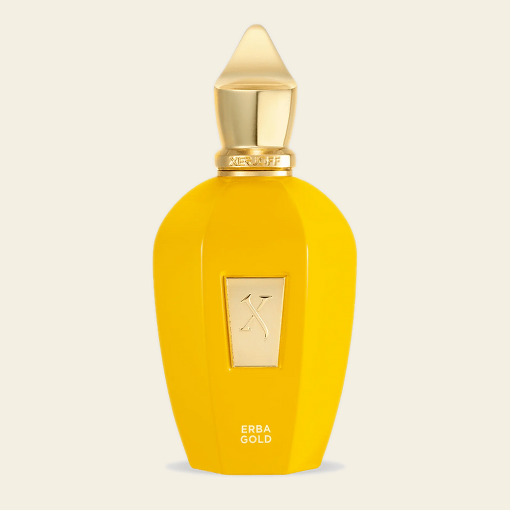 Flacon de parfum Erba Gold par Xerjoff sur fond ivoire