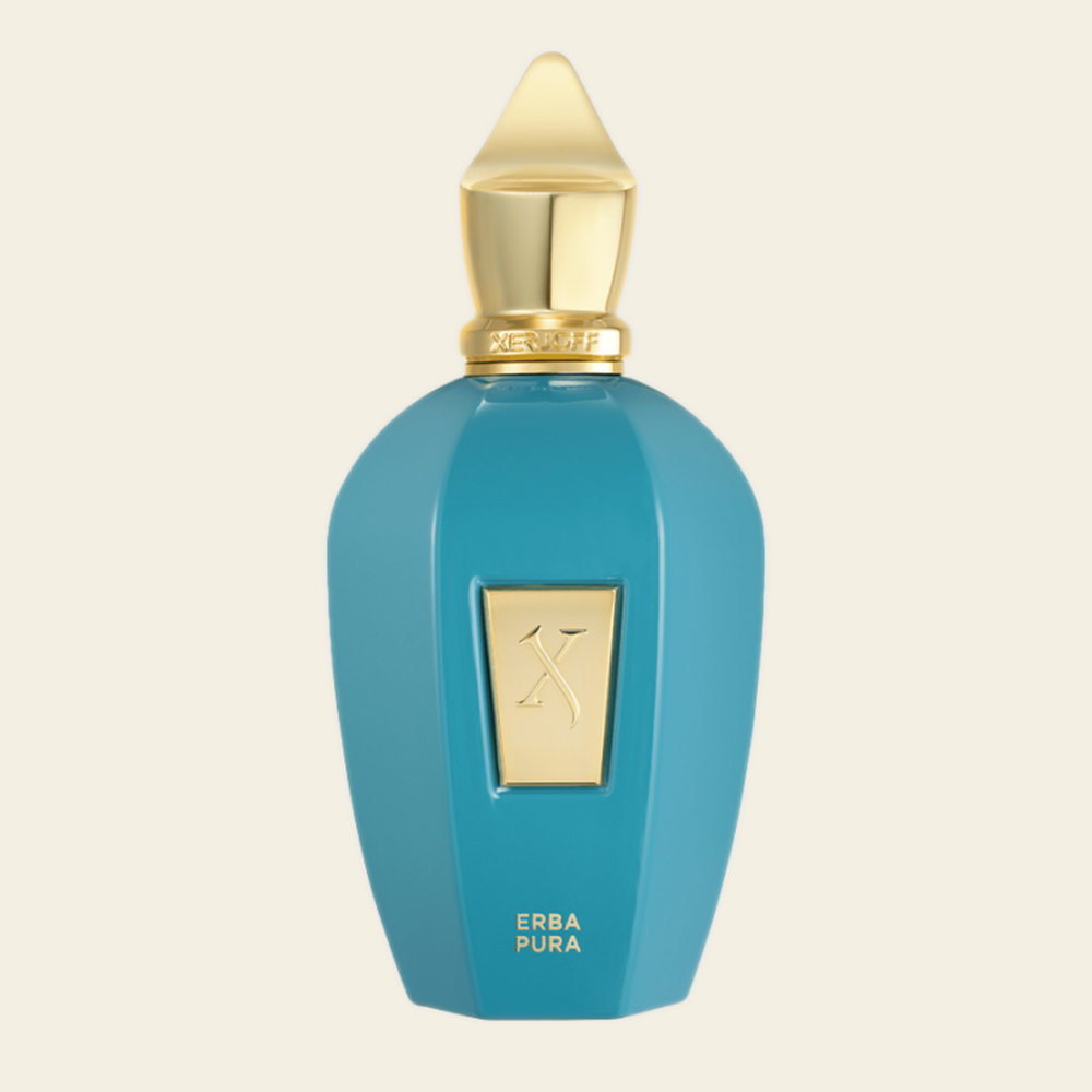 Flacon de parfum Erba Pura par Xerjoff sur fond ivoire