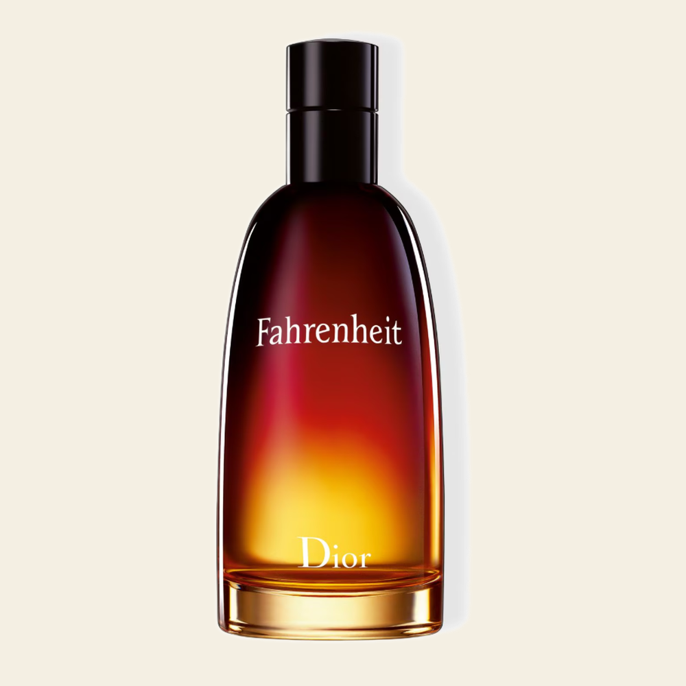 Flacon de parfum Fahrenheit par Dior sur fond ivoire