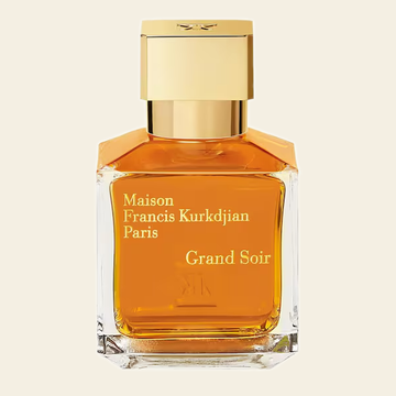 Flacon de parfum Grand Soir par Maison Francis Kurkdjian sur fond ivoire