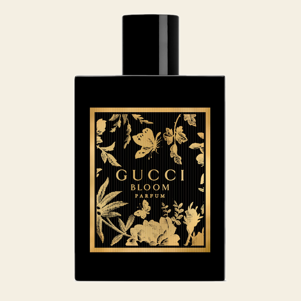 Flacon de parfum Gucci Bloom Parfum par Gucci sur fond ivoire