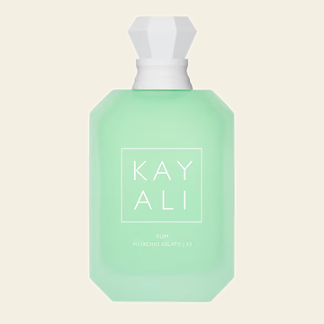 Flacon de parfum Yum Pistachio Gelato | 33 par Kayali sur fond ivoire