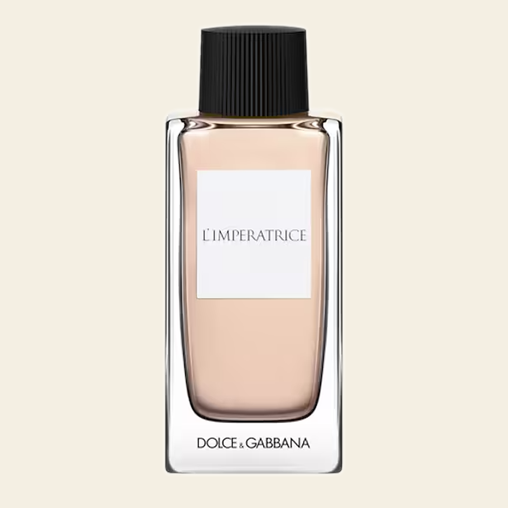 Flacon de parfum L'Impératrice par Dolce & Gabbana sur fond ivoire