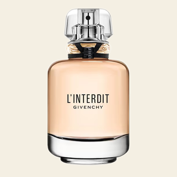 Flacon de parfum L'Interdit Eau de Parfum par Givenchy sur fond ivoire