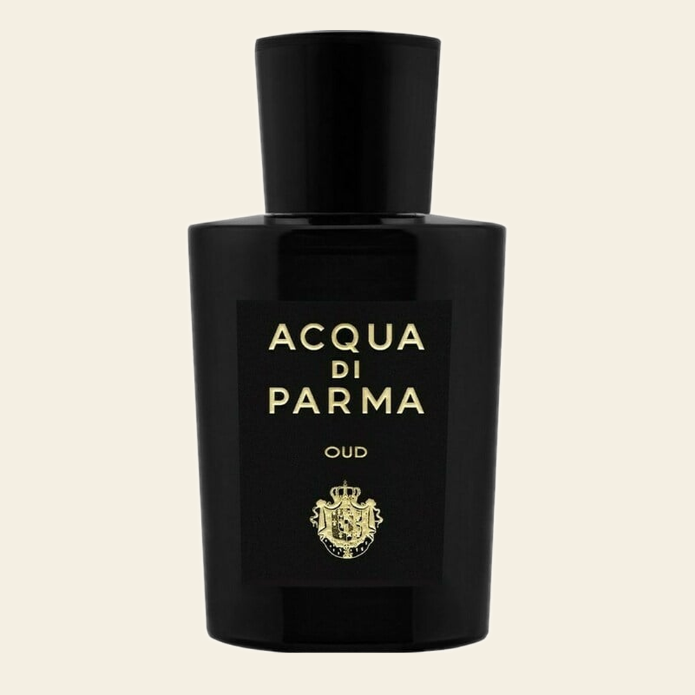 Flacon de parfum OUD par Acqua di Parma sur fond ivoire