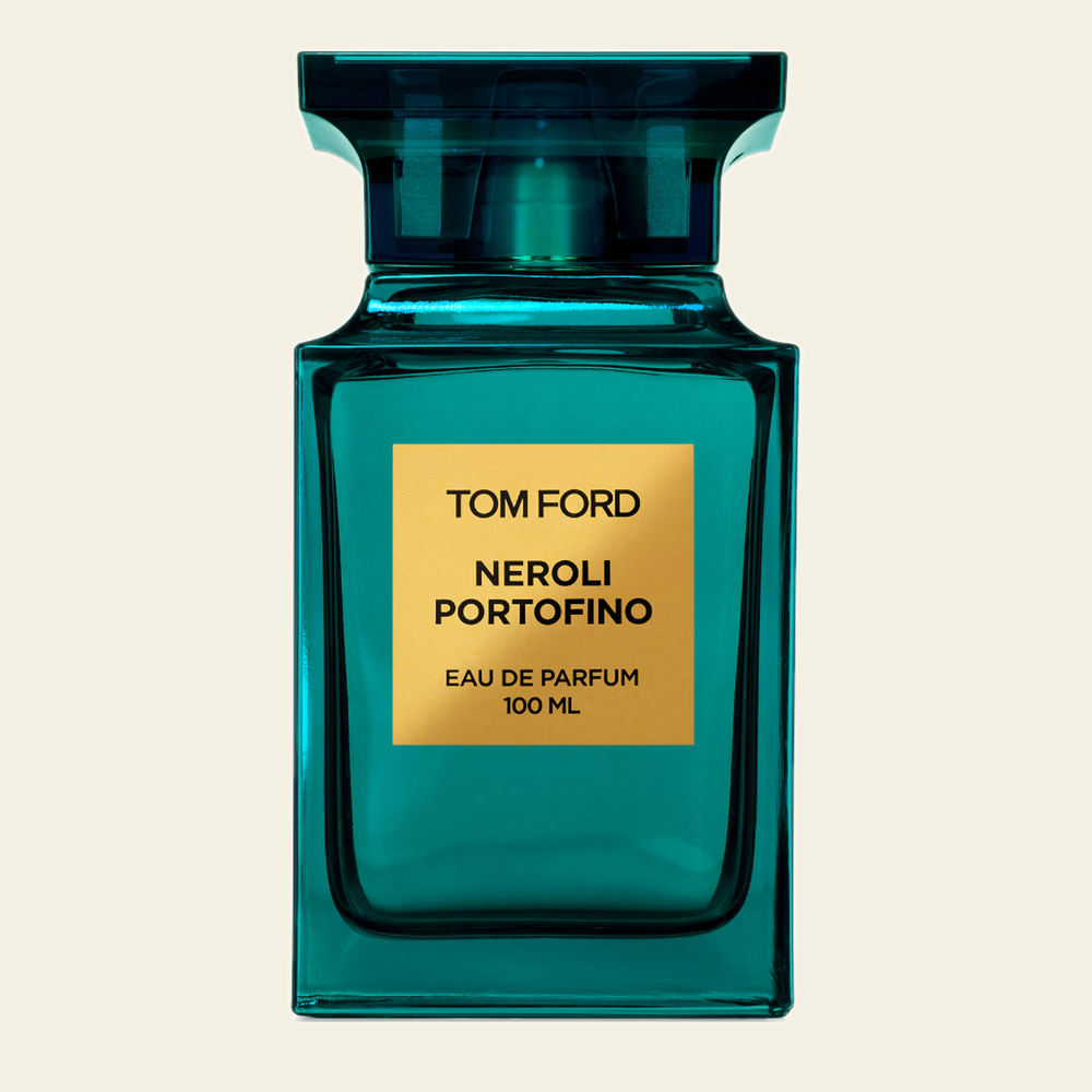 Flacon de parfum Neroli Portofino par Tom Ford sur fond ivoire
