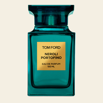 Flacon de parfum Neroli Portofino par Tom Ford sur fond ivoire