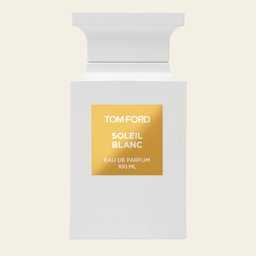 Flacon de parfum Soleil Blanc par Tom Ford sur fond ivoire