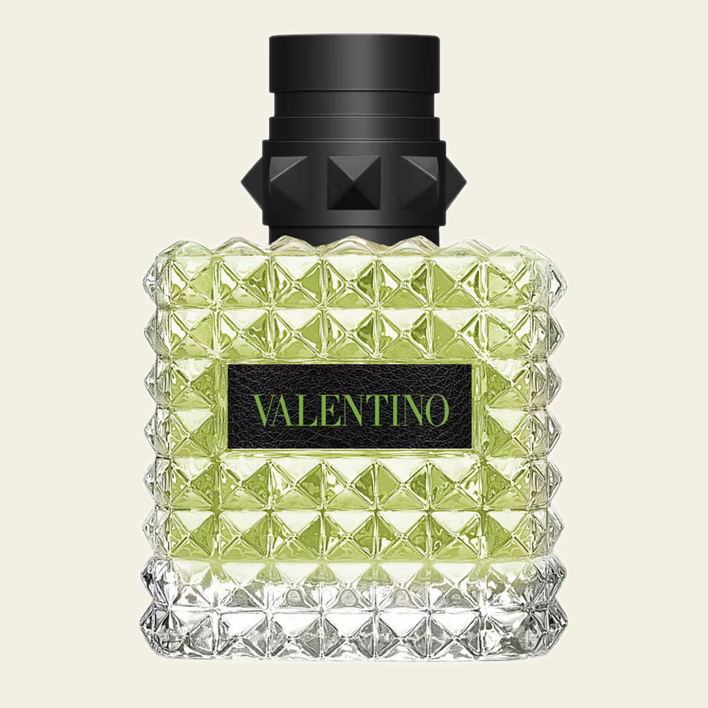 Flacon de parfum Born In Roma Green Stravaganza par Valentino sur fond ivoire