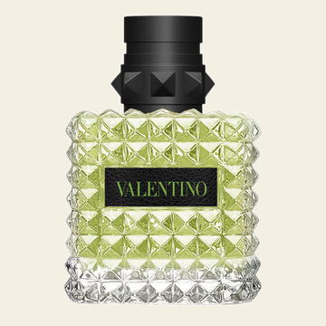 Flacon de parfum Born In Roma Green Stravaganza par Valentino sur fond ivoire