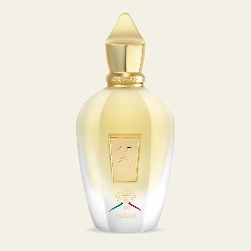 Flacon de parfum Naxos par Xerjoff sur fond ivoire