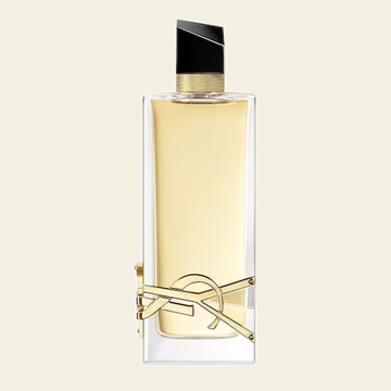 Flacon de parfum Libre par Yves Saint Laurent sur fond ivoire